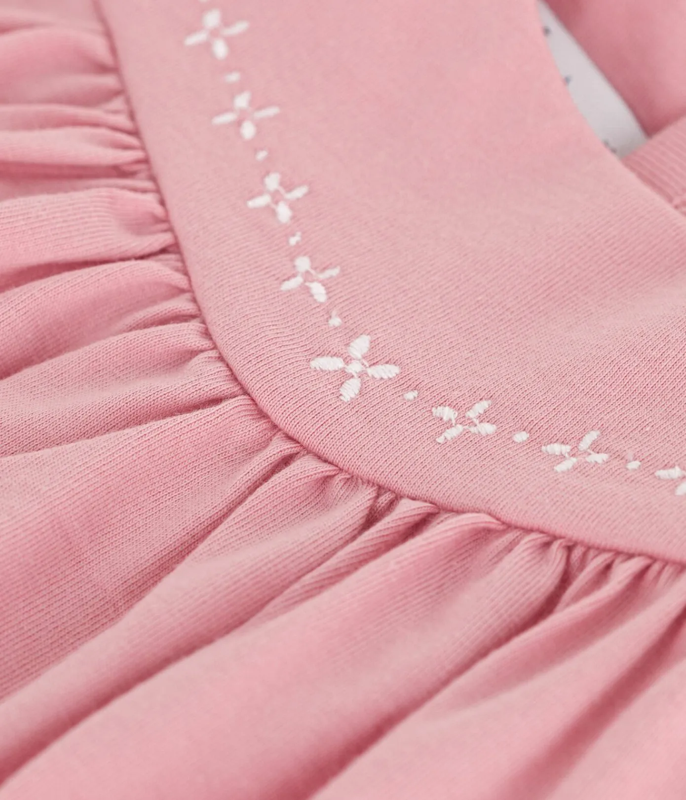 Petit Bateau Kleider*Ärmelloses Baby-Kleid aus einfarbiger Baumwolle mit gestickten Verzierungen am Kragen rosa CHARME